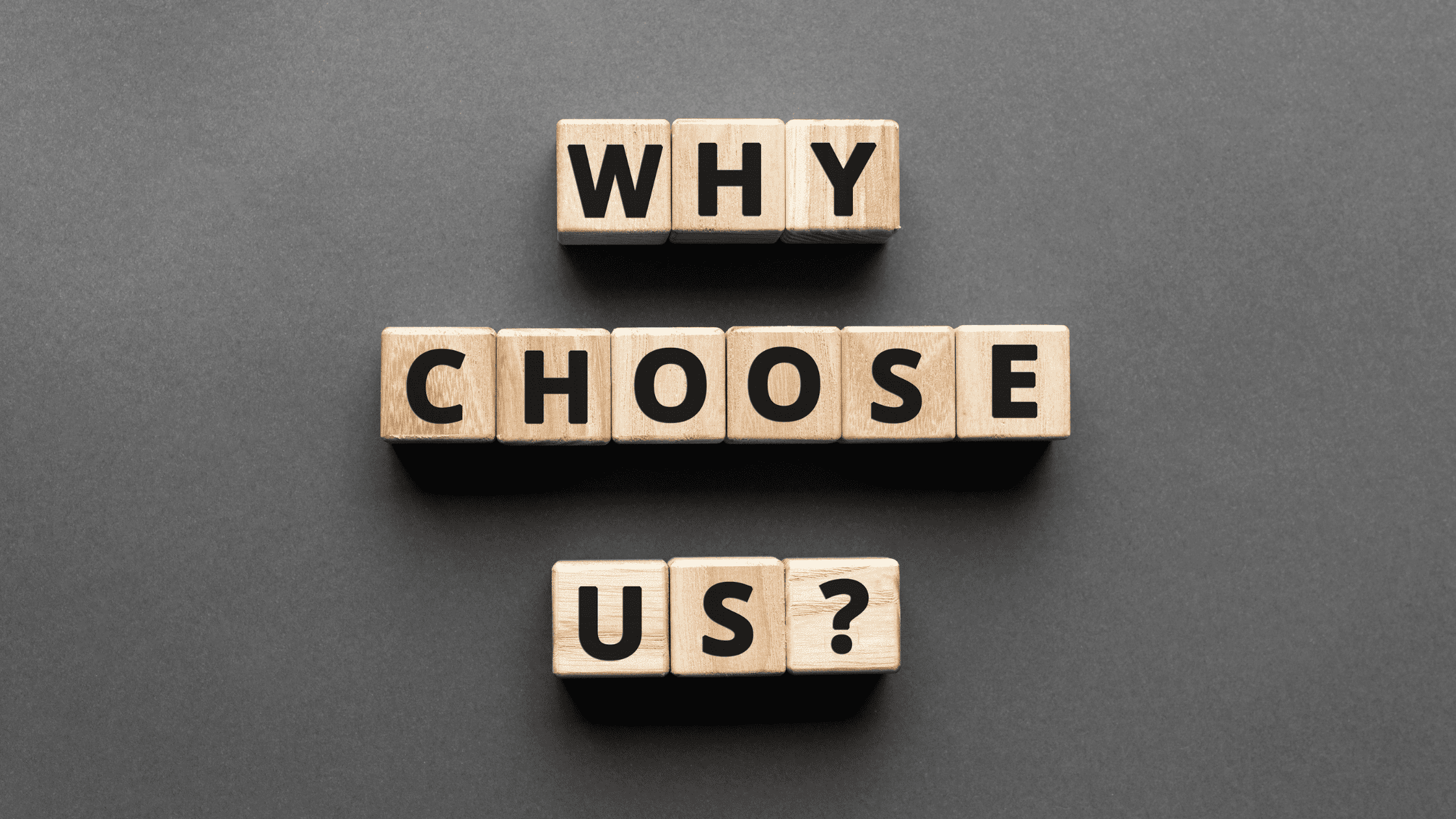 Blocks with letters forming the phrase “Why Choose Us?”