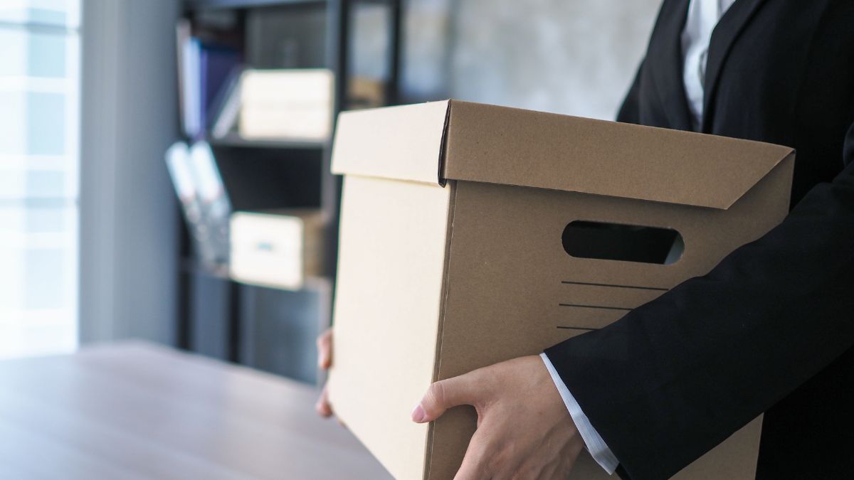 An employee packing up his things